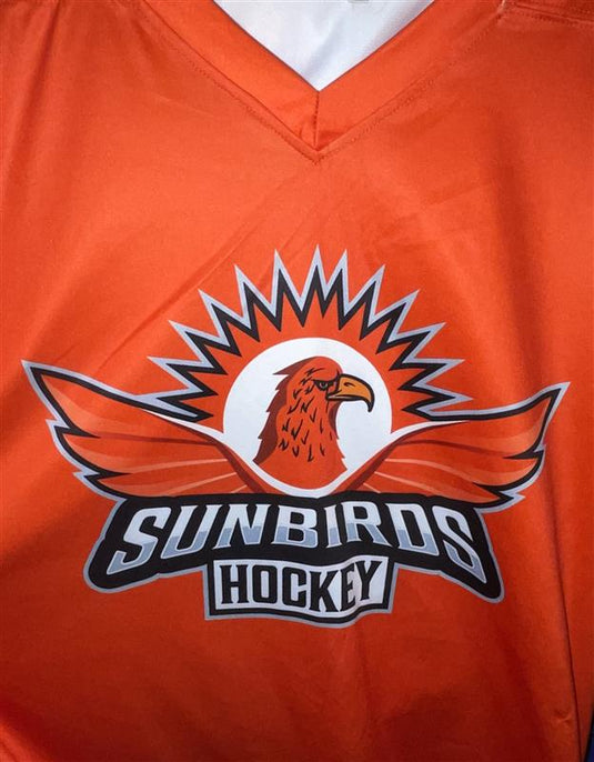 Slightly Used Orange Hockey Jerseys ("Sunbirds")