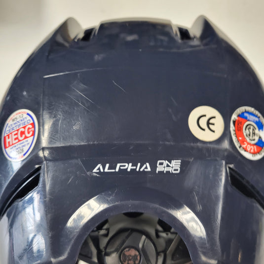 Used Warrior Alpha One Pro With Cage - Size Large